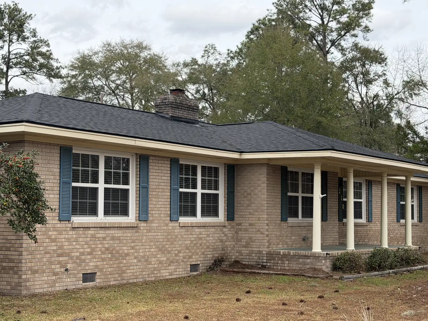 Brick ranch home in Savannah, Georgia with a completed shingle roof